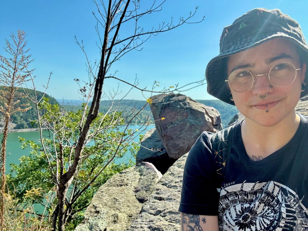 person taking a selfie while on a hike