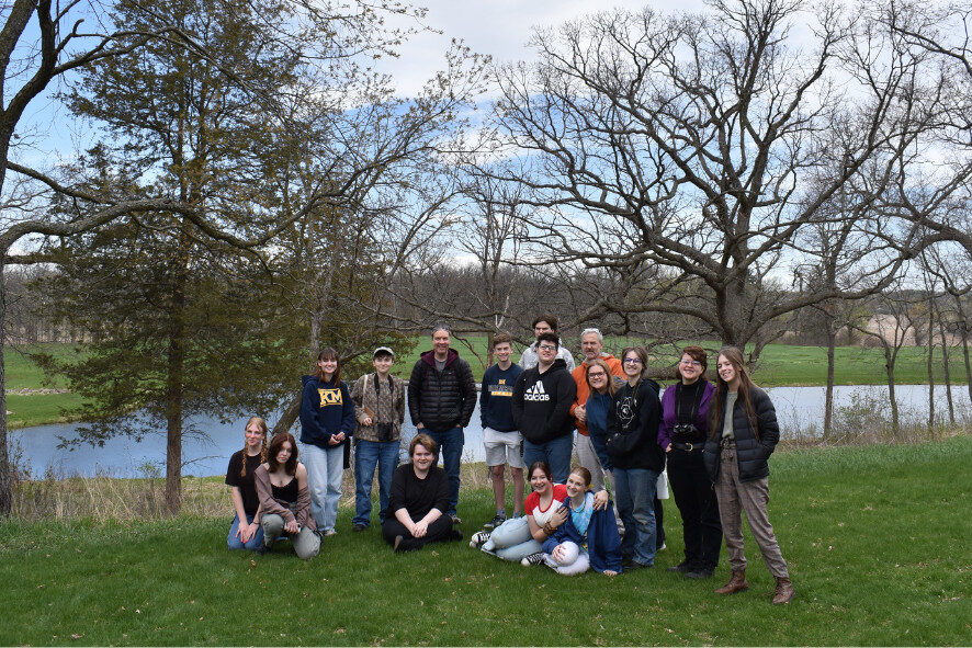 group of birders next to a small body of water
