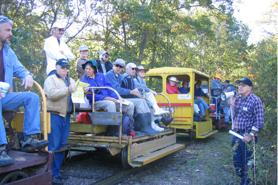Field Trip participants on a train tide through Tiffany Bottoms Wildlife Area