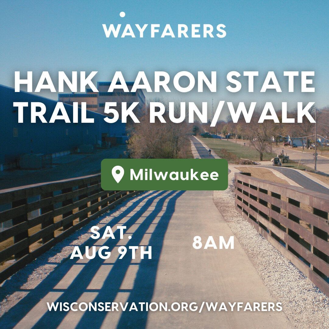 A bridge connecting parts of a bike path with text that reads Wayfarers Hank Aaron State Trail 5k Run/Walk in Milwaukee on Saturday, August 9th at 8am WisConservation.org/Wayfarers