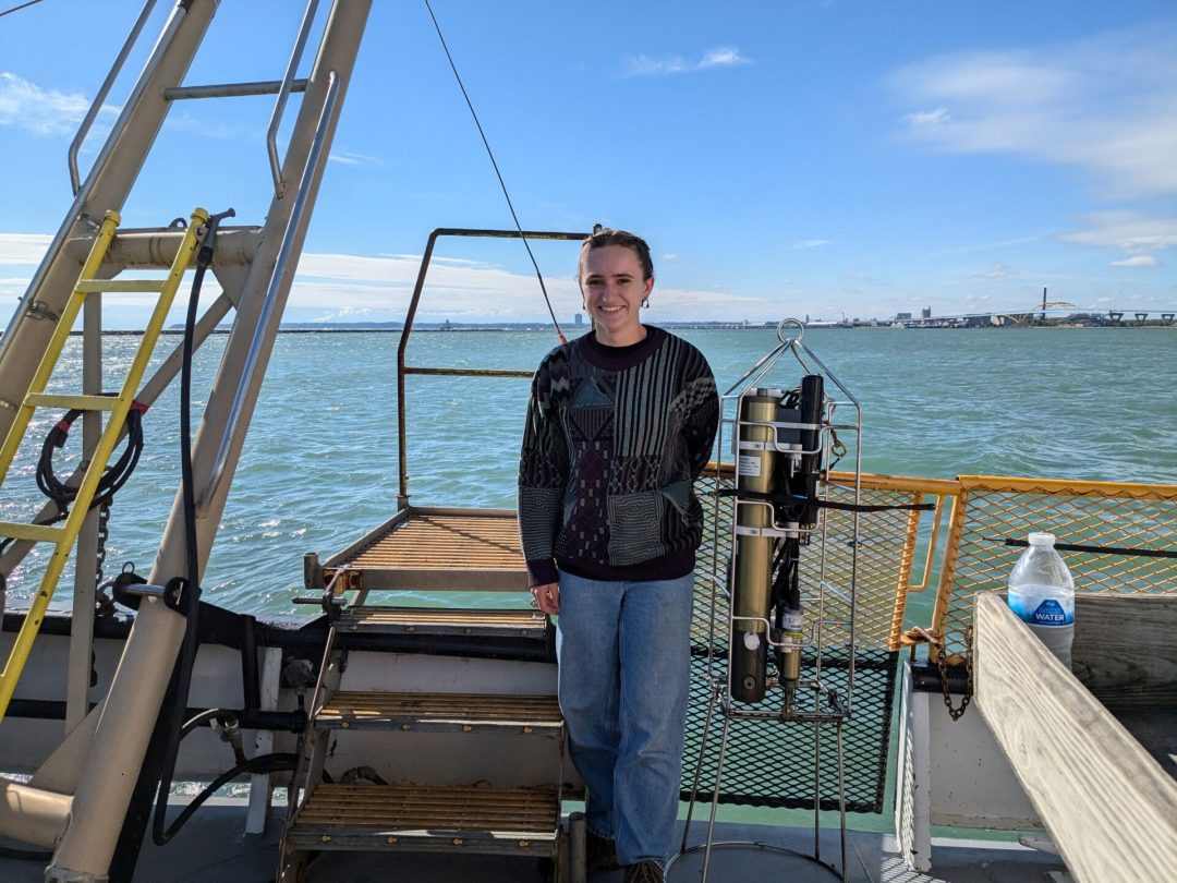 person standing on a boat