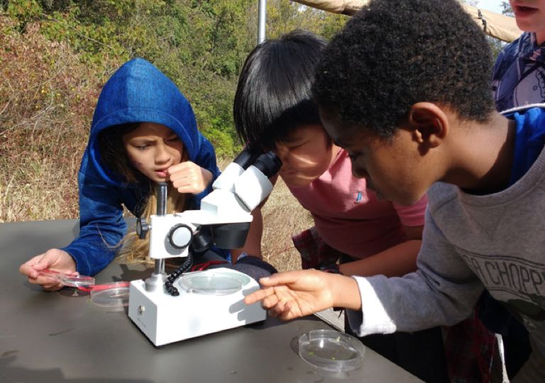 Kids with telescope