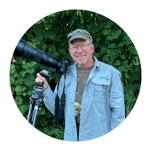Ken standing with his camera
